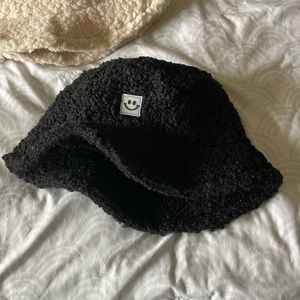 Black Sherpa bucket hat with adjustable strings